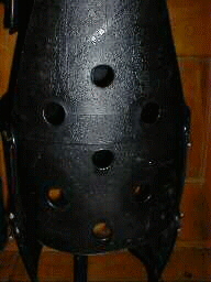 Drilling holes in breastplate